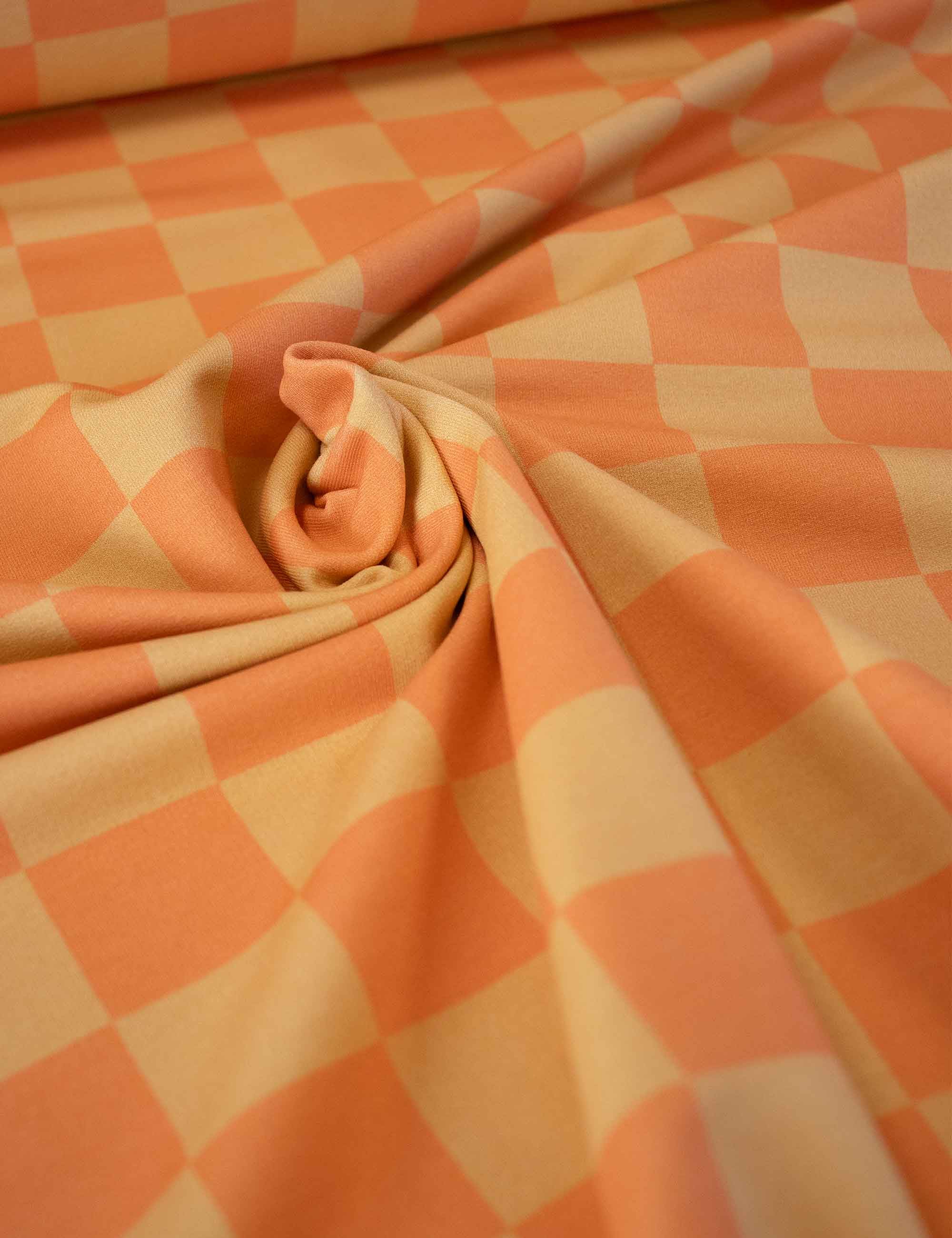 Bittersweet Orange Check – French Terry stof – 170 cm breed