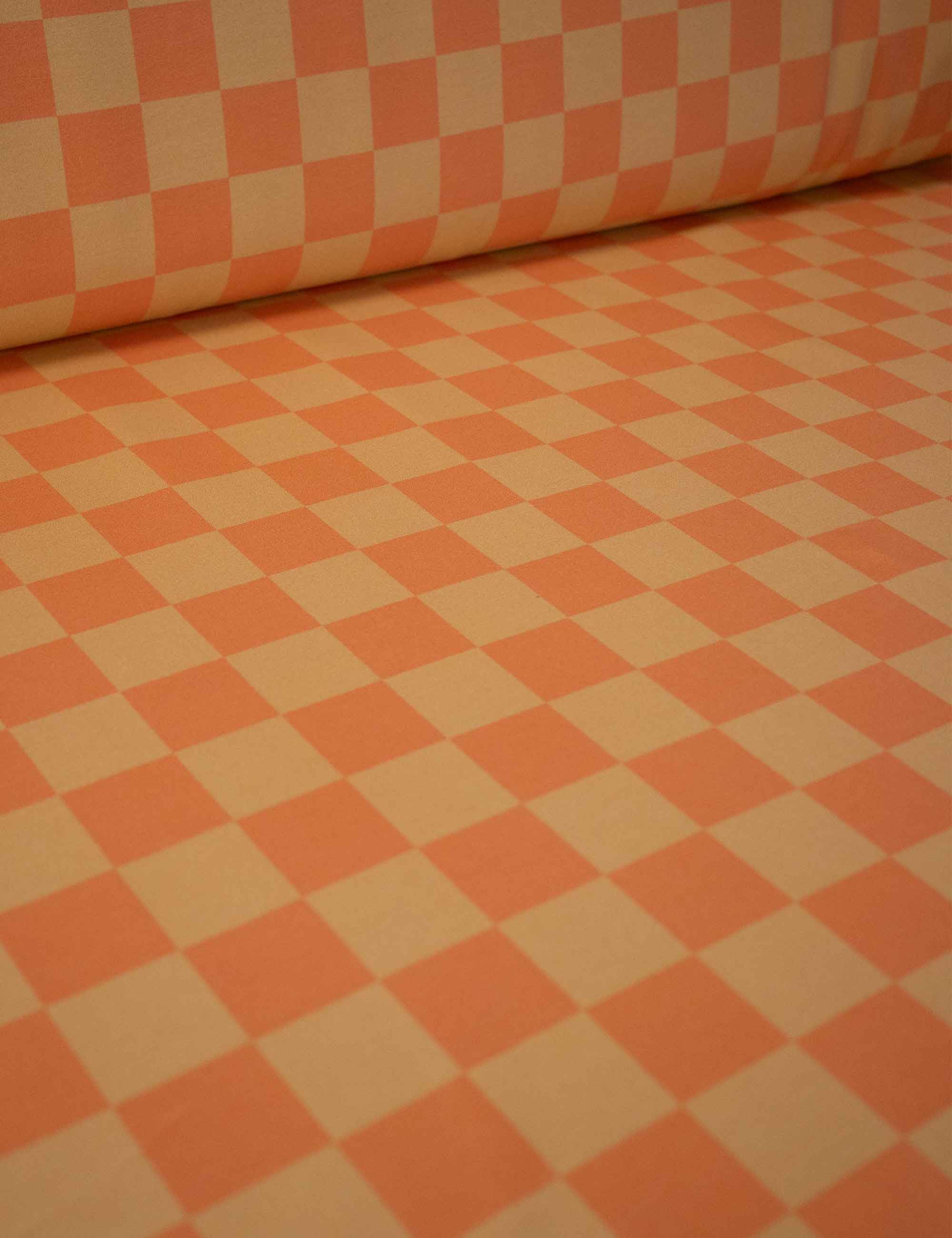 Bittersweet Orange Check – French Terry stof – 170 cm breed