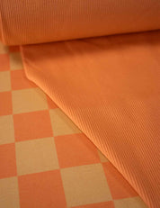 Bittersweet Orange Check – French Terry stof – 170 cm breed