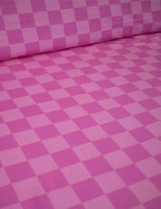 Pink Punch Check – French Terry stof – 170 cm breed