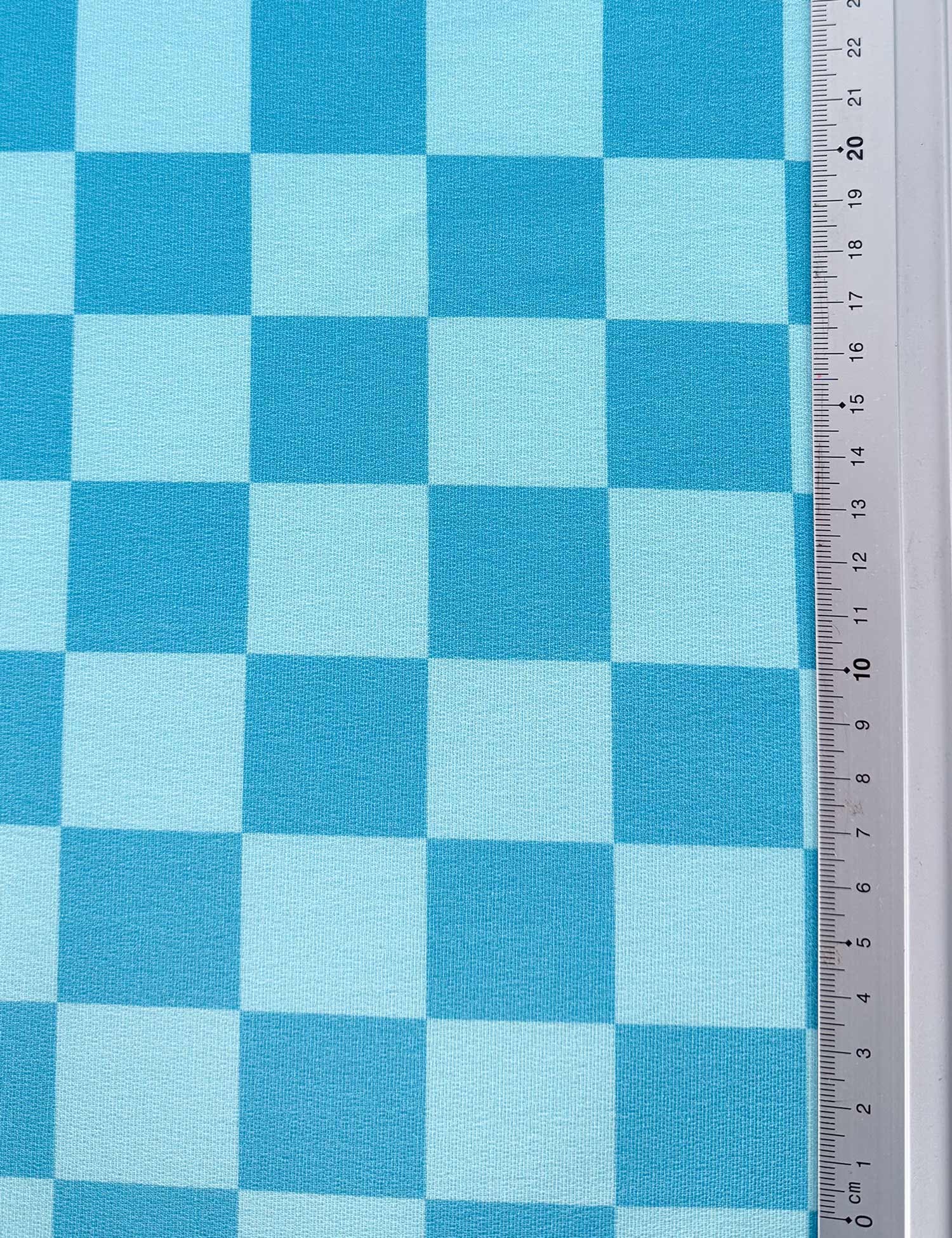 Voltage Blue Checker – French Terry stof – 170 cm breed